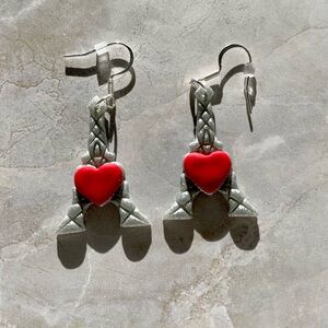 Eiffel Tower earrings.
